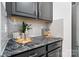 Stylish dark kitchen features granite countertops, gray subway tile backsplash, and stainless steel appliances at 18607 Mainsail Ct, Lancaster, SC 29720