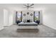 Spacious main bedroom with neutral tones, decorative mirrors and lighting, and large windows at 18607 Mainsail Ct, Lancaster, SC 29720