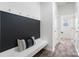 Convenient mudroom features a bench with coat hooks and access to the home's entry at 18607 Mainsail Ct, Lancaster, SC 29720