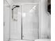 Bright, glass-encased shower with a rainfall showerhead and built-in shelving at 18607 Mainsail Ct, Lancaster, SC 29720