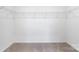 A spacious and bright walk-in closet with shelving and carpet at 18607 Mainsail Ct, Lancaster, SC 29720