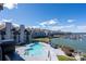A stunning view of the complex pool, boat docks, and lake make this a great location for recreation at 18877 Vineyard Point Ln, Cornelius, NC 28031