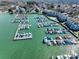 Aerial view of a marina with numerous boats docked along the piers, surrounded by waterfront properties at 18877 Vineyard Point Ln, Cornelius, NC 28031