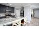 Eat-in kitchen featuring stainless steel appliances and granite countertop at 18877 Vineyard Point Ln, Cornelius, NC 28031