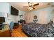 Inviting bedroom featuring hardwood floors, ample closet space, contemporary design, and a ceiling fan at 205 Kaitlyn Ln, Kings Mountain, NC 28086
