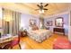 Bedroom with hardwood floors, ceiling fan, and tray ceiling at 205 Kaitlyn Ln, Kings Mountain, NC 28086