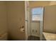 This well-lit bathroom features tile floors, a stand-up shower, and a modern vanity at 216 W Shannonhouse St, Shelby, NC 28152