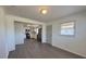 Bright living space featuring stylish flooring and seamless flow to the updated kitchen at 216 W Shannonhouse St, Shelby, NC 28152