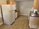 Kitchen featuring laminate countertop, cabinets, and standard appliances at 220 Valleyview Pl, Salisbury, NC 28144