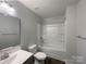 Bathroom features a shower/tub combo, a sink, and tile flooring at 2236 Sussex Rd, York, SC 29745