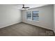 Bedroom features a ceiling fan, ample natural light, and neutral decor at 2236 Sussex Rd, York, SC 29745