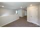 Upstairs hallway with neutral carpet near the bedrooms at 2236 Sussex Rd, York, SC 29745