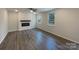 Spacious living room features a modern fireplace, hardwood floors, and plenty of natural light at 2236 Sussex Rd, York, SC 29745