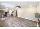 Open concept living room featuring durable floors, ceiling fan, and lots of natural light at 2236 Sussex Rd, York, SC 29745