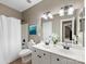 This bathroom features double sinks, tile flooring, and a shower-tub combo at 2300 Bonnie Butler Way, Charlotte, NC 28270