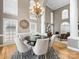 Dining room features tall windows, and an open concept layout at 2300 Bonnie Butler Way, Charlotte, NC 28270