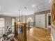 Landing with hardwood floors and a view of the living room below at 2300 Bonnie Butler Way, Charlotte, NC 28270