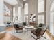 Spacious living room features tall windows and an open concept layout at 2300 Bonnie Butler Way, Charlotte, NC 28270