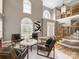Elegant living room with soaring ceilings and an abundance of natural light at 2300 Bonnie Butler Way, Charlotte, NC 28270