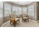 Cozy sitting area by the windows provides plenty of natural light at 2300 Bonnie Butler Way, Charlotte, NC 28270