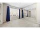 Large bedroom with lots of natural light and mirrored wall at 2359 Eagle Glen Ct, Gastonia, NC 28056