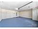 Large garage with carpet, large door and lots of storage at 2359 Eagle Glen Ct, Gastonia, NC 28056