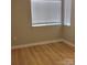 Bright bedroom featuring natural light, blinds, and light wood flooring at 2545 Stockbridge Dr, Charlotte, NC 28210
