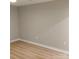 Empty neutral room with updated flooring and modern baseboards at 2545 Stockbridge Dr, Charlotte, NC 28210