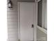 Exterior door with a window and light fixture at 2545 Stockbridge Dr, Charlotte, NC 28210