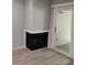 Living room area with a modern fireplace and access to the outside patio at 2545 Stockbridge Dr, Charlotte, NC 28210