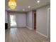 Spacious living room with recessed lighting and access to the outdoors at 2545 Stockbridge Dr, Charlotte, NC 28210