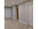 Neutral living room features wood floors and lots of natural light at 2545 Stockbridge Dr, Charlotte, NC 28210