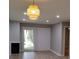 Modern living room features recessed lights and a view of the backyard at 2545 Stockbridge Dr, Charlotte, NC 28210