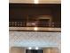 The stainless steel microwave is built into the cabinetry at 2545 Stockbridge Dr, Charlotte, NC 28210