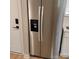 Modern stainless steel refrigerator with water and ice dispenser is perfect for any kitchen at 2545 Stockbridge Dr, Charlotte, NC 28210