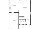 A floor plan featuring a kitchen, living room, foyer, garage, and WC on the first floor at 2609 Riley Woods Ln, Charlotte, NC 28269