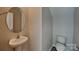 Elegant half bathroom with a pedestal sink at 299 Berrybeth Cir, China Grove, NC 28023