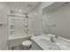 Bathroom featuring a tub and shower, a toilet, and a modern vanity with contemporary fixtures at 299 Berrybeth Cir, China Grove, NC 28023