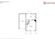 First floor plan featuring a garage, half bath, kitchen, and living room at 299 Berrybeth Cir, China Grove, NC 28023