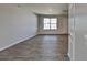 Inviting living room featuring laminate floors and a bright window at 299 Berrybeth Cir, China Grove, NC 28023