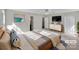 Inviting bedroom with a stylish decor, featuring a large window and closet for seamless storage solutions at 331 Don Mccarter Dr, Clover, SC 29710