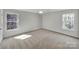 Bedroom with carpet and two windows offering natural light and views of the outdoors at 331 Don Mccarter Dr, Clover, SC 29710