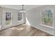 Bright dining area with plenty of natural light, chandelier, and access to the backyard at 331 Don Mccarter Dr, Clover, SC 29710