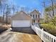 Charming home boasts a two-car garage, classic siding, and a welcoming front porch for relaxing and entertaining at 331 Don Mccarter Dr, Clover, SC 29710