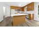 Bright kitchen features wood cabinets, stainless steel appliances, and a center island with white countertops at 331 Don Mccarter Dr, Clover, SC 29710