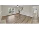 Bright living room features a ceiling fan, wood flooring, and a window with a view at 331 Don Mccarter Dr, Clover, SC 29710