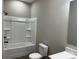Bathroom showcasing a tub and shower combination, toilet, and vanity with modern fixtures at 3342 York Hwy, Gastonia, NC 28052