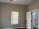 Bright bedroom with door and new flooring at 3342 York Hwy, Gastonia, NC 28052
