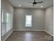 Spacious bedroom features windows and ceiling fan at 3342 York Hwy, Gastonia, NC 28052