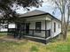 Charming one-story home featuring a covered front porch with black railings and fresh landscaping at 3342 York Hwy, Gastonia, NC 28052